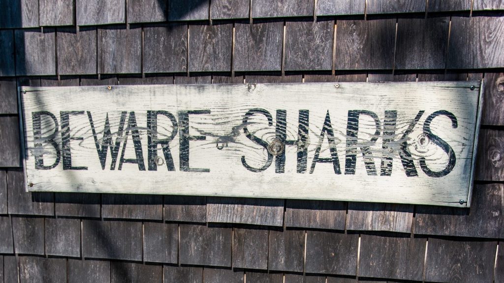 A sign that is on the side of a building